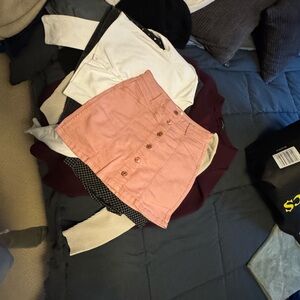 Skirts and tops and dress and a sweater